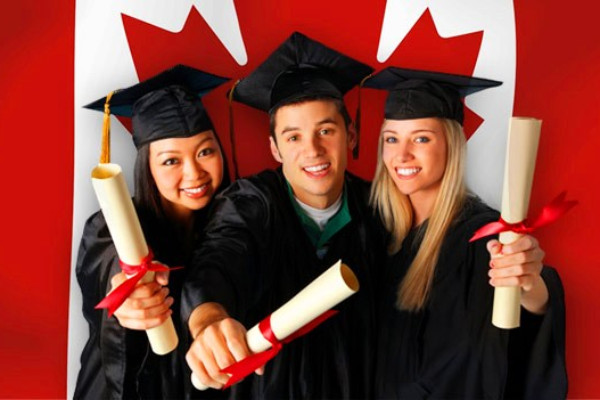 A group of people in graduation gowns and capsDescription automatically generated
